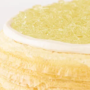 Detail shot of Lady M's Champagne Mille Crêpes. Layers of crêpe, cream, and champagne gelée.