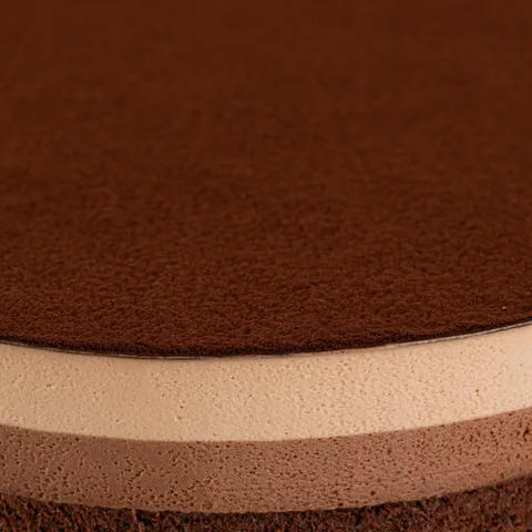 Detail shot of Lady M's Chocolate Arc-en-Ciel. Layers of sponge cake, mousse, and ganache.