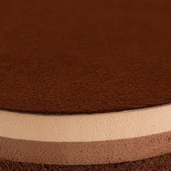 Detail shot of Lady M's Chocolate Arc-en-Ciel. Layers of sponge cake, mousse, and ganache.