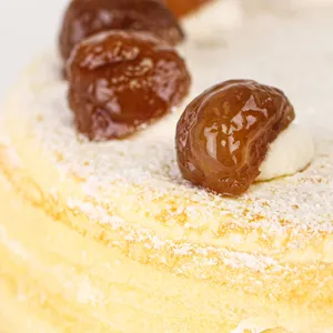 Detail shot of Lady M's Marron Mille Crêpes. Layers of crêpe, cream, and glazed chestnut.