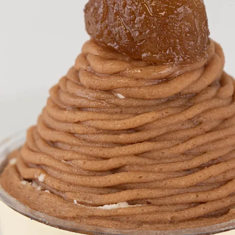 Detail shot of Lady M's Mont Blanc. Layers of cream, chestnut purée and a candied chestnut.