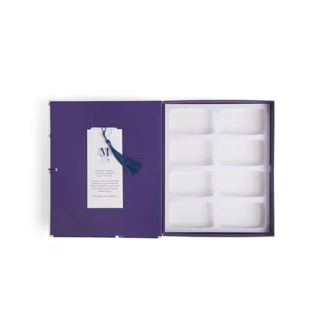 A thumbnail shot of an open Lady M 8-piece "The Midtown" Box Bon Bon Book.