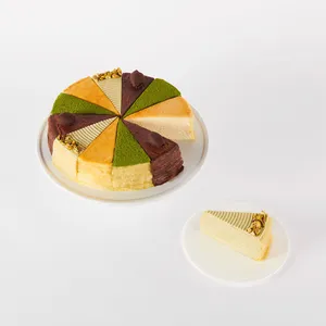 A thumbnail shot of a Lady M Slice of the Best: Celebration Collection with one sliced on a plate.