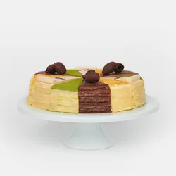 A thumbnail shot of a Lady M Slice of the Best: Classic Collection on top a white cake stand.