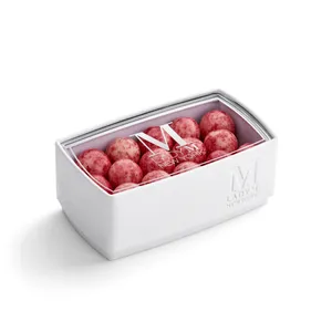 A thumbnail shot of a Lady M Lucky Lychee Pearls encased inside a packaging with a Lady M logo.