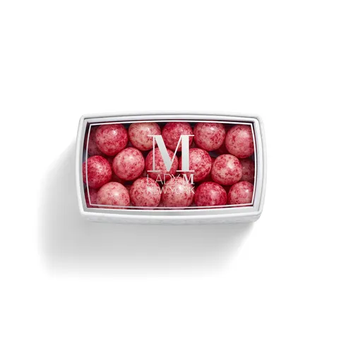 A thumbnail shot of a Lady M Lucky Lychee Pearls encased inside a packaging with a Lady M logo.