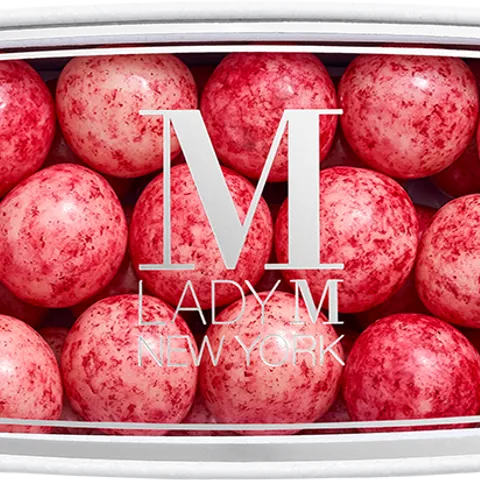 A thumbnail shot of a Lady M Lychee Fruit Jelly encased inside a packaging with a Lady M logo.