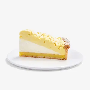 A thumbnail shot of Lady M's Sweet Corn Tart slice on top a white round plate.