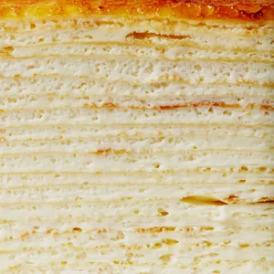 A detail shot of Lady M's Signature Mille Crêpes. Layers of crêpes and pastry cream.