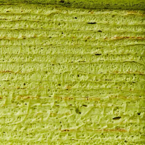 Lady M Green Tea Mille Crêpes close up: layers of crepes and green tea cream.