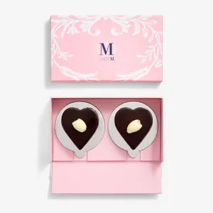 A 2-pc set of Lady M's Couronne du Chocolat Heart cake in a pink mini box case.