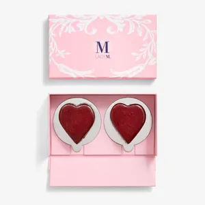 A 2-pc set of Lady M's Framboise au Chocolat Valentine Heart cake in a pink mini box case.