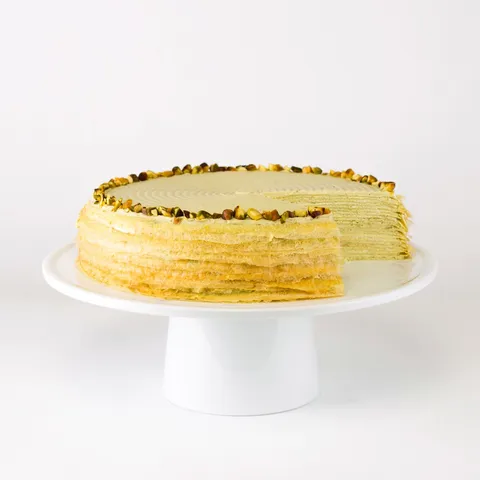 Lady M's Pistachio Mille Crêpes: thin crêpes, pistachio pastry cream, chopped pistachios.
