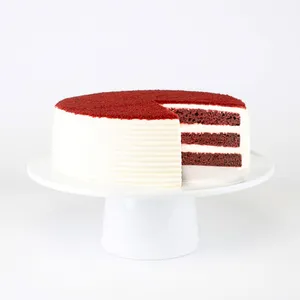 Lady M's Red Velvet Cake: rich red velvet sponge, cream cheese frosting, red velvet crumbs.