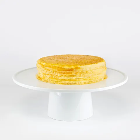 Lady M 6" Signature Mille Crêpes: thin crêpes, light pastry cream, caramelized top.