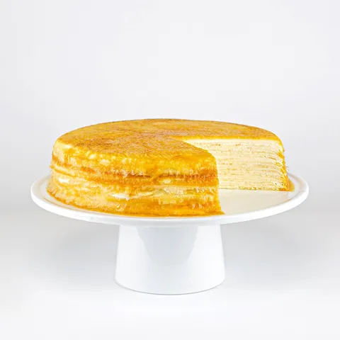 Lady M Signature Mille Crêpes: thin crêpes, light pastry cream, caramelized top.