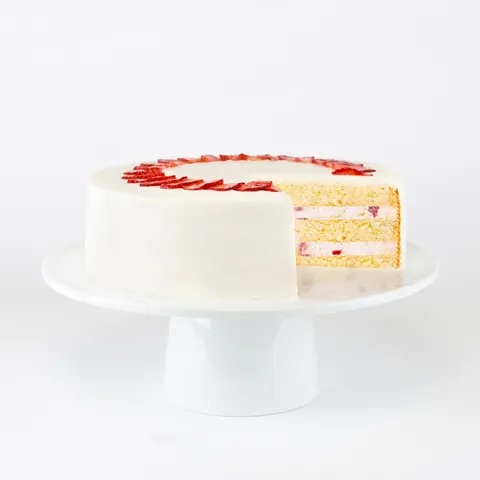 Lady M's Strawberry Shortcake: vanilla sponge, fresh strawberries, strawberry cream, whipped cream topping.
