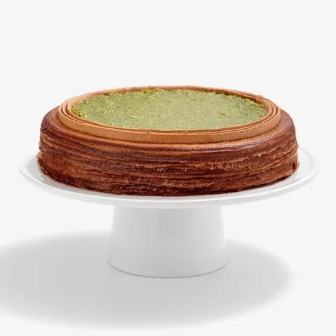 Lady M's Dubai Chocolate Mille Crêpes with chocolate layers & green knafeh-inspired topping.