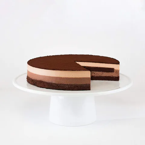Lady M's Chocolate Arc-en-Ciel: dark chocolate sponge, milk chocolate cream, dark chocolate cream, cocoa powder.