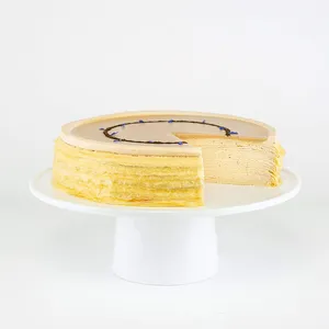 Lady M's Earl Grey Mille Crêpes: layers of crêpes and Earl Grey pastry cream, topped with tea glaze and blue cornflowers.