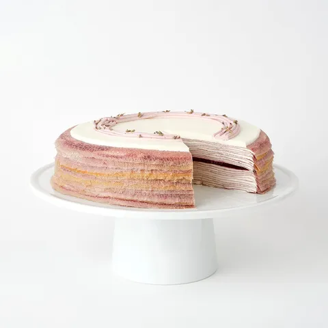 Lavender Mille Crêpes: paper-thin crêpes, lavender cream, blackberry jelly center, lavender flowers, lavender-blackberry piping.