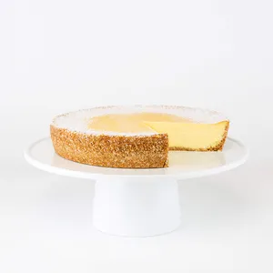 Lady M's Passion Fruit Cheesecake: creamy cheesecake with passion fruit puree, coconut graham crust, and snow sugar.