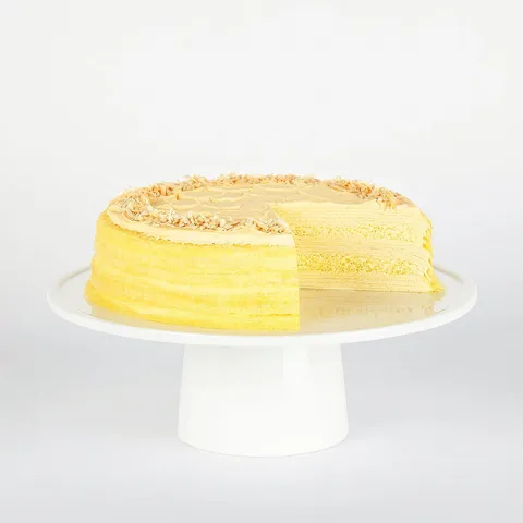 Lady M Tres Leches Mille Crêpes: milk-soaked sponge, crêpes, blonde chocolate cream, whipped cream, coconut.