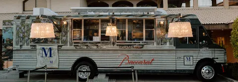 Lady M x Baccarat Cake Truck: Crystal chandeliers shining bright.