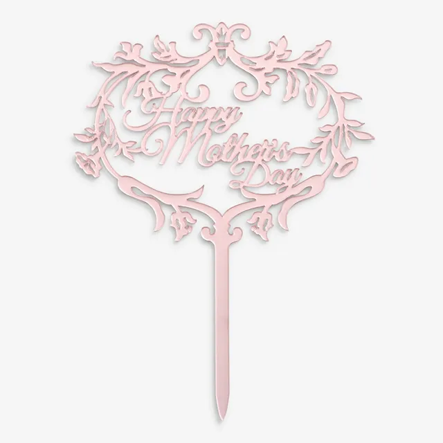 An elegant rose colored cake topper with ornate decorative laurels surrounding the words "Happy Mother's Day" in a cursive script. The design features a long pick at the bottom for inserting into a cake.