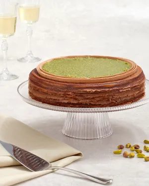 Lady M Dubai Chocolate Mille Crêpes: chocolate crêpes, chocolate and pistachio creams, crispy kataifi, pistachio, tahini topping.