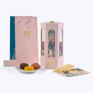 The full Lady M Gift Set with a lantern box, matching bag, card, and mooncakes.