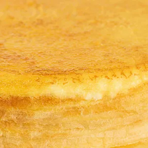 Close-up image of Lady M's Gluten-Free Signature Mille Crêpes showing the thin crêpe layers.