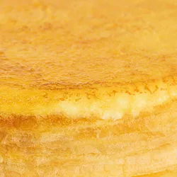Close-up image of Lady M's Gluten-Free Signature Mille Crêpes showing the thin crêpe layers.