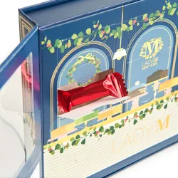 A close up of an open Lady M 2025 Holiday Crêpe Biscuit Tasting Set.