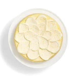 Top-down of a whole Lady M Orange Mille Crepes cake.