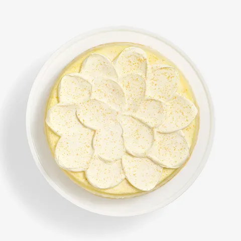 Top-down of a whole Lady M Orange Mille Crepes cake.