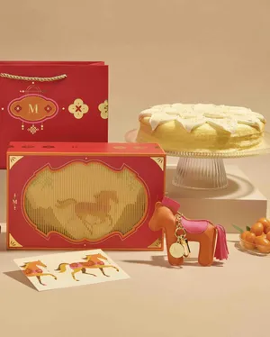 Lady M's 2026 Year of the Horse Gift Set with an Orange Mille Crêpes cake.