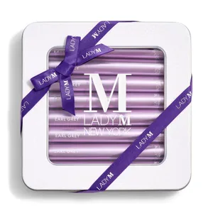 Lady M's Earl Grey Crêpe Biscuits with a logo on the top lid and a blue ribbon.