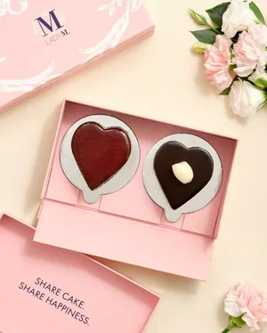 Lady M's Chocolate Duo Heart Cake Gift Set in a custom pink box with the words "Share cake, share happiness."