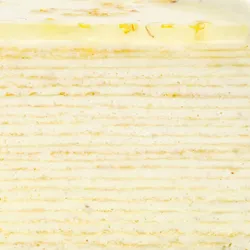 Close-up of Osmanthus Mille Crêpes layers with delicate cream filling and handcrafted crêpe texture