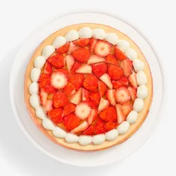 Overhead view of cake showing strawberry topping and whipped cream border
