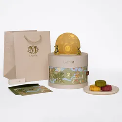 Lady M Mid-Autumn gift set with bag, mooncakes, notecard, and glowing moon topper