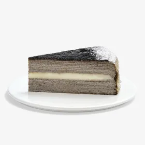 Single slice of Sesame Mochi Mille Crêpes cake on white plate, cream layer visible