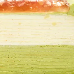 Close-up of Coconut Matcha Mille Crêpes' layered matcha and cream crêpe texture