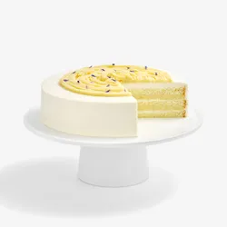 Sliced Sweet Potato Shortcake revealing vanilla sponge and cream layers