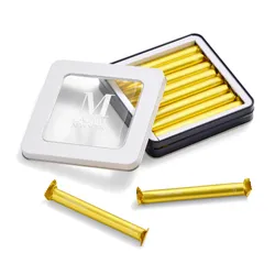 Open tin of Passion Fruit Crêpe Biscuits with two biscuits beside it