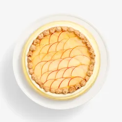 Top view of Apple Pie Mille Crêpes with fanned apple slices ringed by crumble clusters